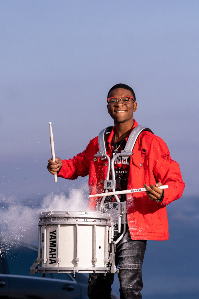 Dahmonni, a senior at Lake Stevens, playing his snare drum in downtown Everett during his senior photo session.