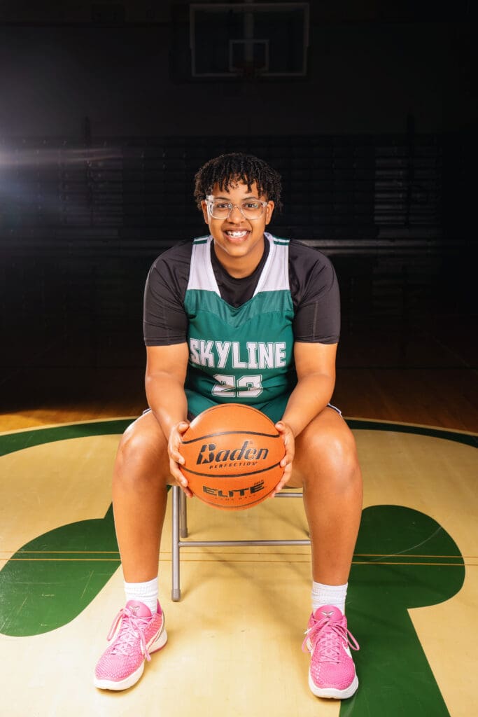 Skyline High School senior basketball player holding a ball, captured by Issaquah and Sammamish senior photographer.