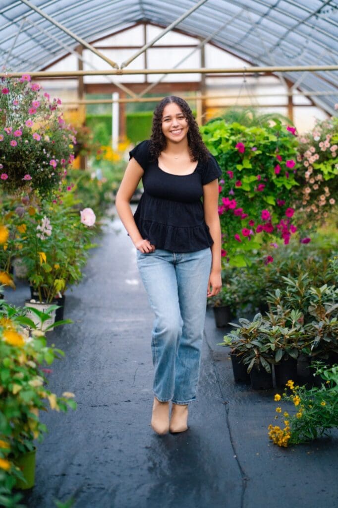 Senior portrait in a vibrant flower field, captured by Issaquah senior photographer.